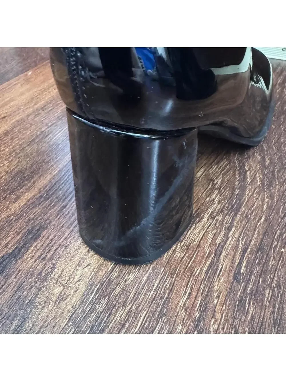 Black knee-high/go go boots with a 4” heel